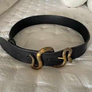 Authentic Gucci leather and brass serpent belt. Size small.